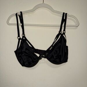 Victoria's Secret Black Bra with Underwire and Unique Strap Design